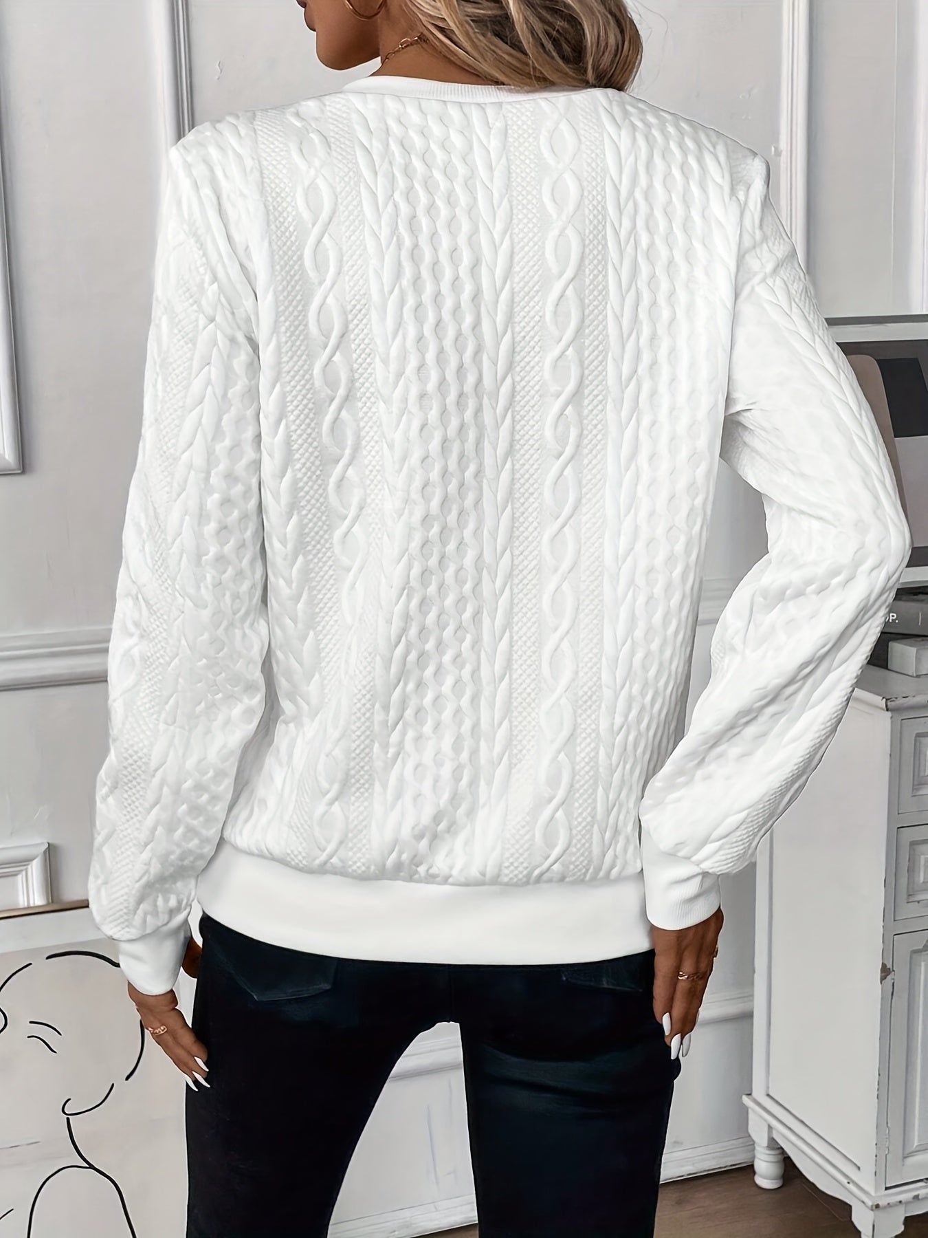 Montaracrest Amy™ sweater with ribbed cuffs and neckline, in soft knit fabric, displayed on a neutral background.