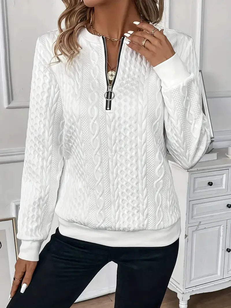 Montaracrest Amy™ sweater with a stylish knit design and side slit, perfect for cozy casual wear.