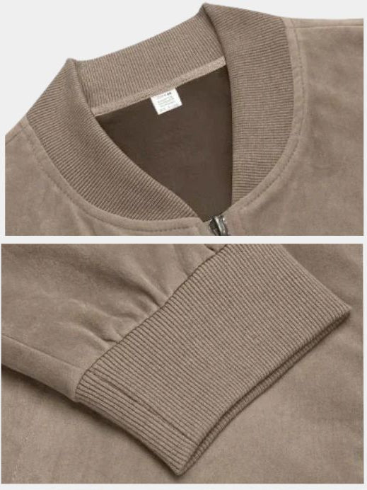 Montaracrest ashwood bomber jacket in suede, stylish and elegant, displayed on a hanger with a neutral background.