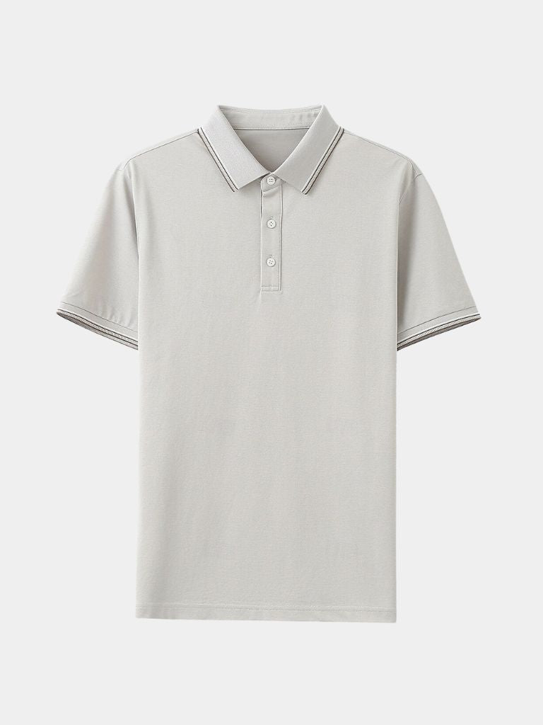 Montaracrest Polo Classica Azure featuring a classic design with a cross crown logo on a vibrant blue polo shirt.