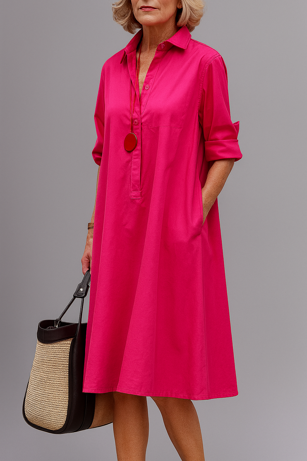 Montaracrest Isabella elegant midi dress featuring a stylish blouse-inspired design and sophisticated silhouette.