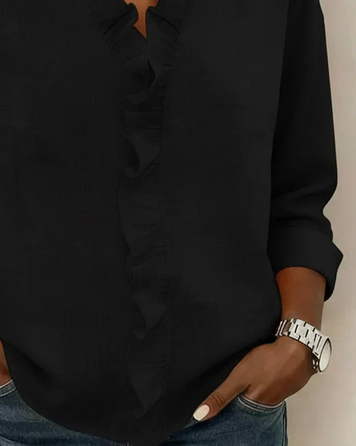Montaracrest Chiara V-neck blouse with delicate ruffle detailing, stylish and feminine top for casual or dressy occasions.