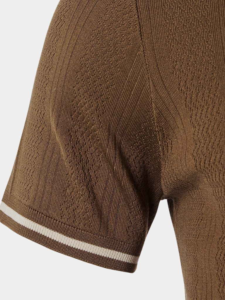 Montaracrest Café Milano Polo shirt featuring a cross crown logo, in classic polo style with a collar and button placket.
