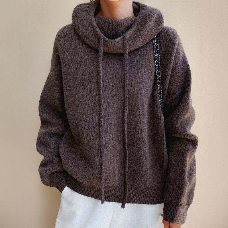 Montaracrest Napoli cozy sweater with a roll neck, made from soft merino wool, displayed on a neutral background.