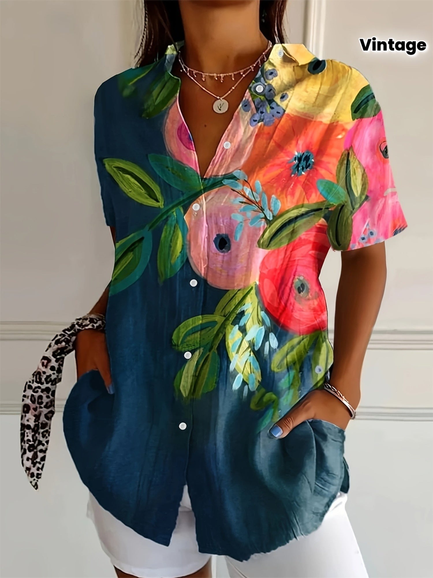 Light summer blouse by Montaracrest, featuring floral pattern and breathable fabric, perfect for warm-weather wear.