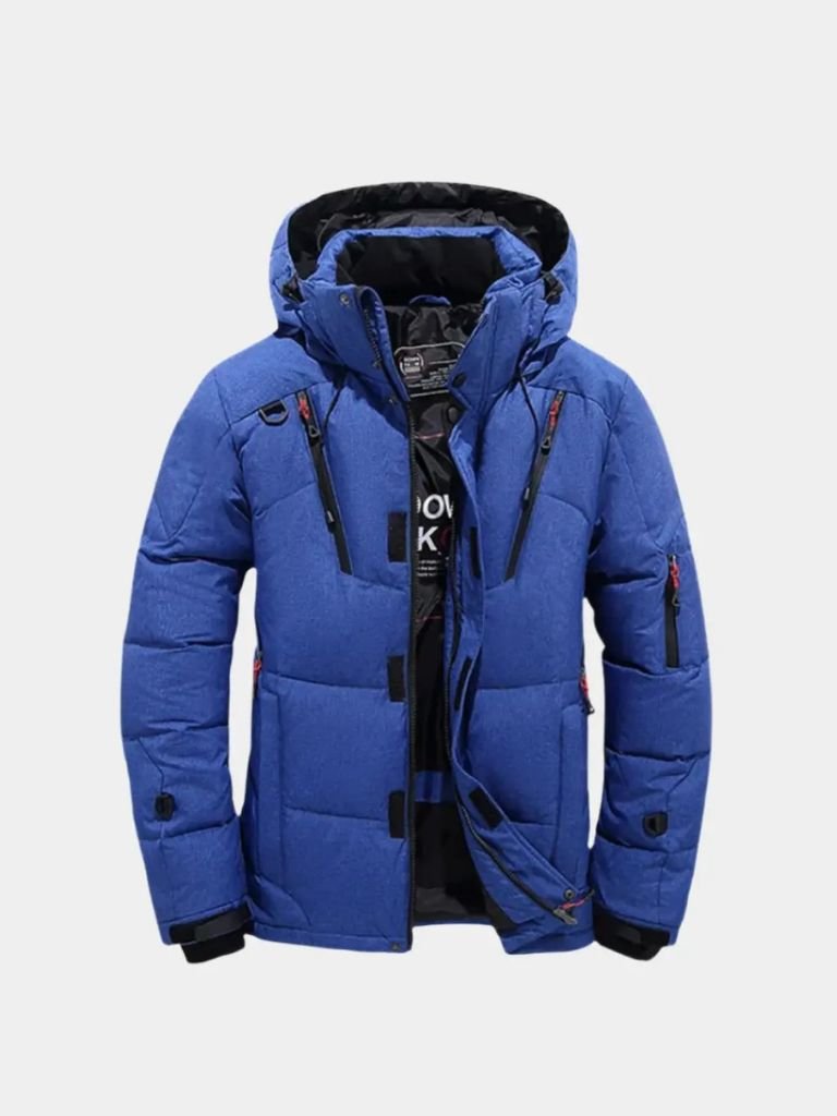 Montaracrest Essential Puffer Jacket in black with a cross crown logo, showcasing its quilted, insulated design for cold weather.