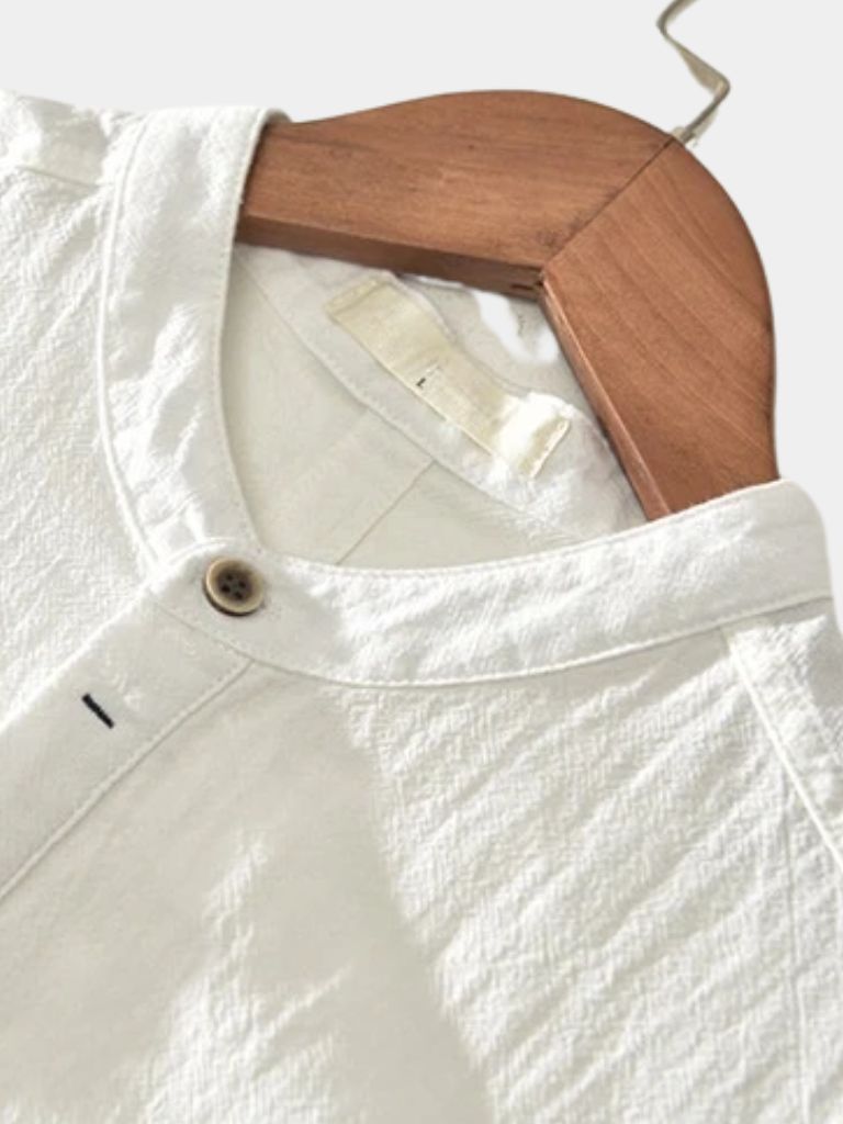 Montaracrest linen short-sleeve shirt with a cross crown design, lightweight and casual for warm weather.
