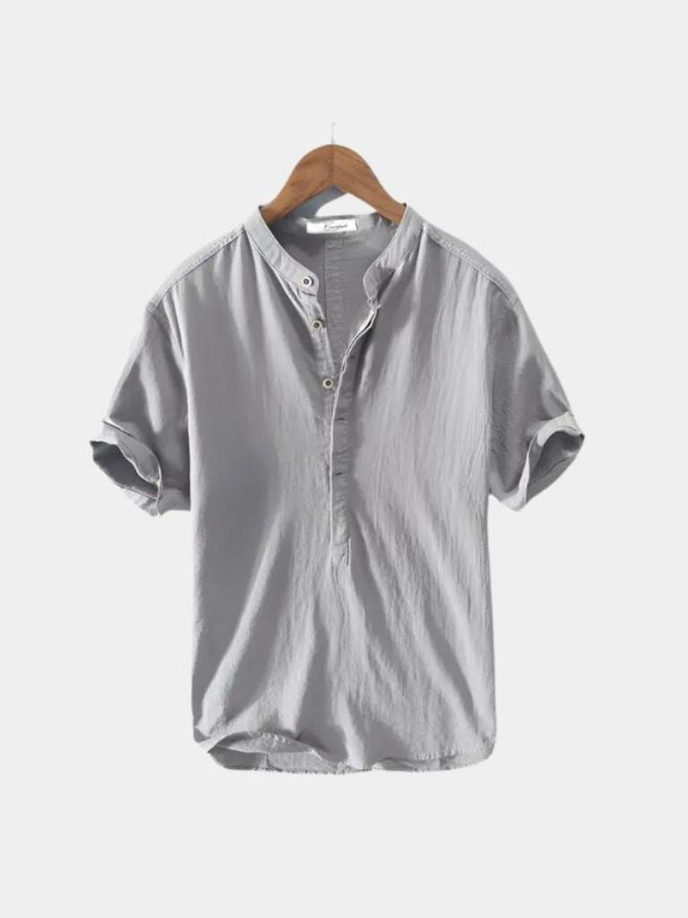 Montaracrest essential short-sleeve linen shirt with a classic collar and cross crown design, lightweight and breathable for summer.