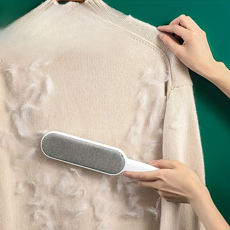 Montaracrest fabric and lint brush with ergonomic handle for removing lint, fuzz, and pet hair from clothing and upholstery.