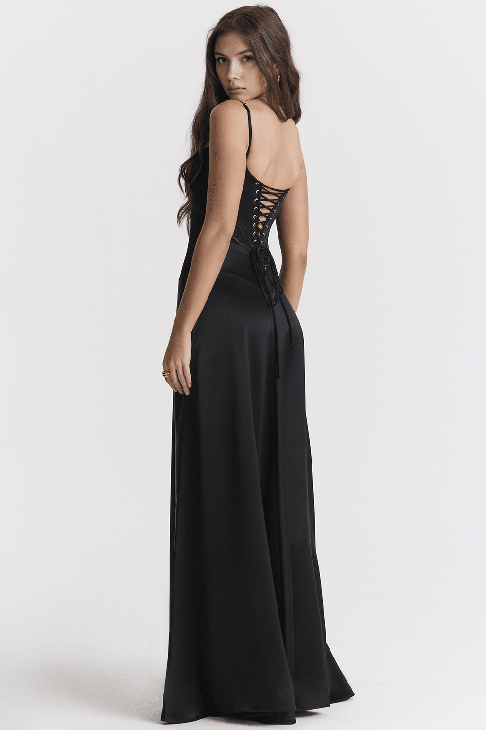 Montaracrest Anabella Dress displayed on a hanger, featuring a stylish, elegant design with intricate details and a flowing fabric.