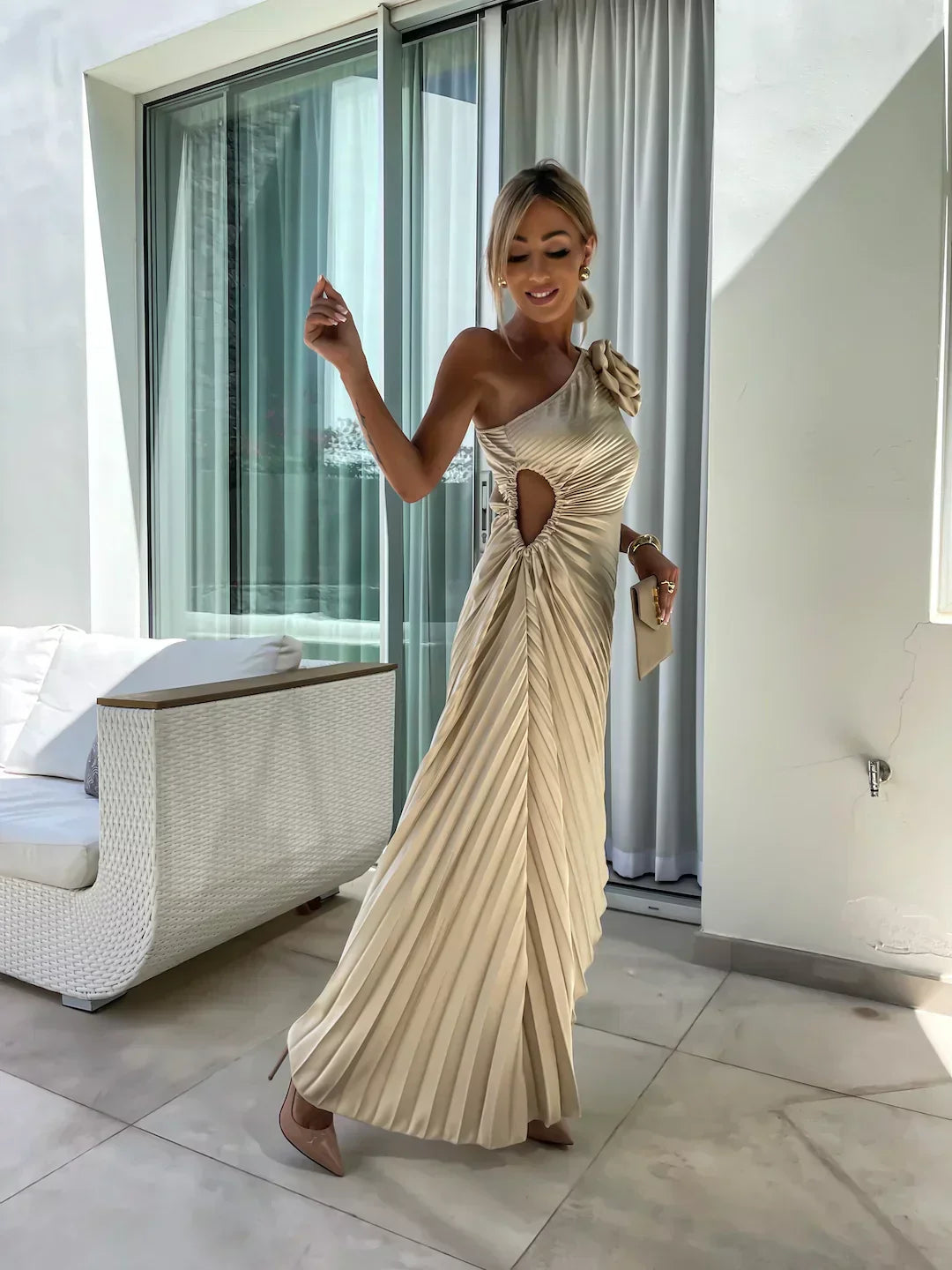 Beige floral asymmetry dress by Montaracrest featuring a chic, flowing design suitable for special occasions.