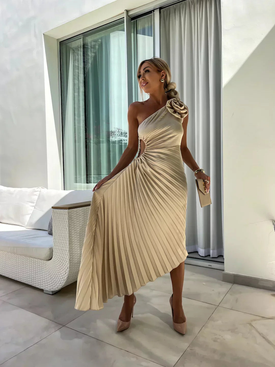 Beige floral asymmetry dress by Montaracrest featuring a chic, flowing design perfect for special occasions.