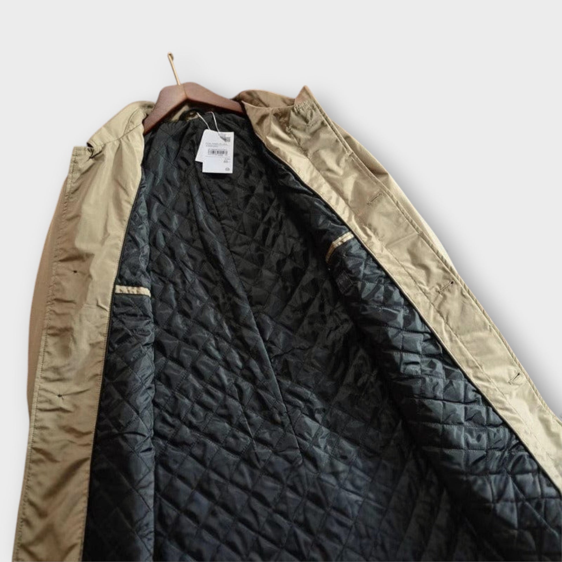 Alessandro™ Hareth waterproof coat by Montaracrest, displayed in dark color with a hood and zipper front, suitable for rainy weather.