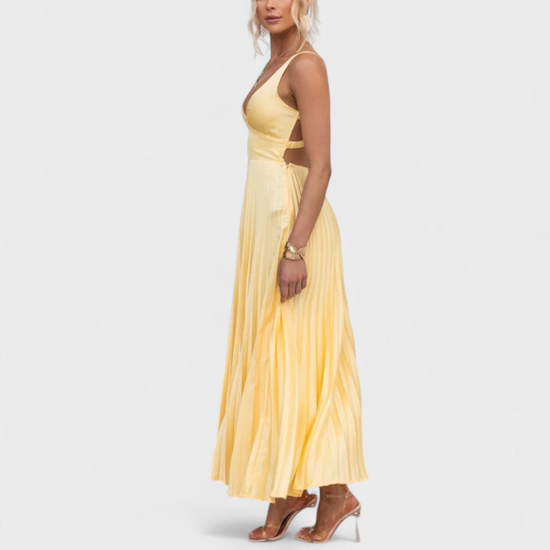 Montaracrest Aby summer ribbed artisan dress featuring a sleeveless design and textured fabric on a model.