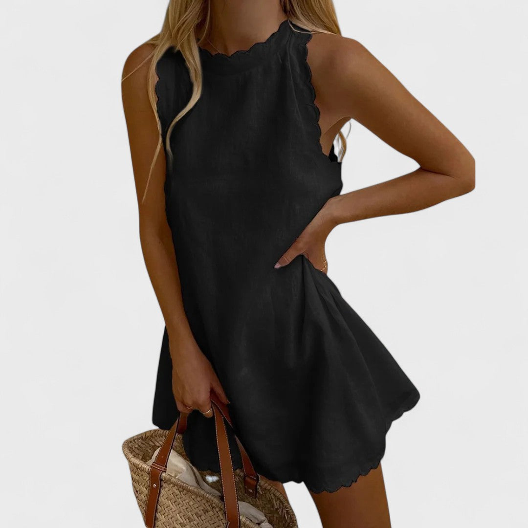 Bianca premium embroidered short dress by Montaracrest, featuring intricate embroidery and a stylish, fitted silhouette.