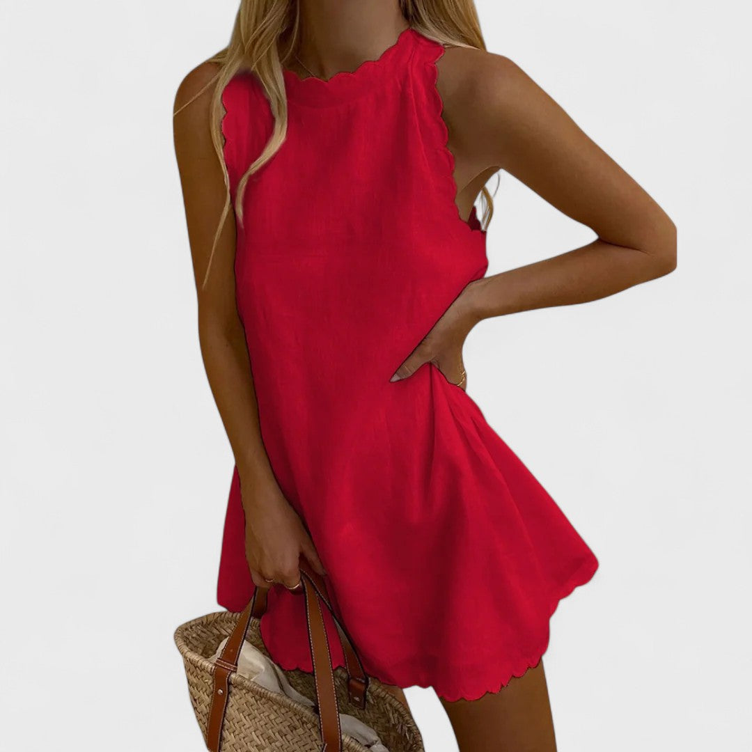 Bianca short dress by Montaracrest with intricate embroidery, featuring a fitted silhouette and elegant design.