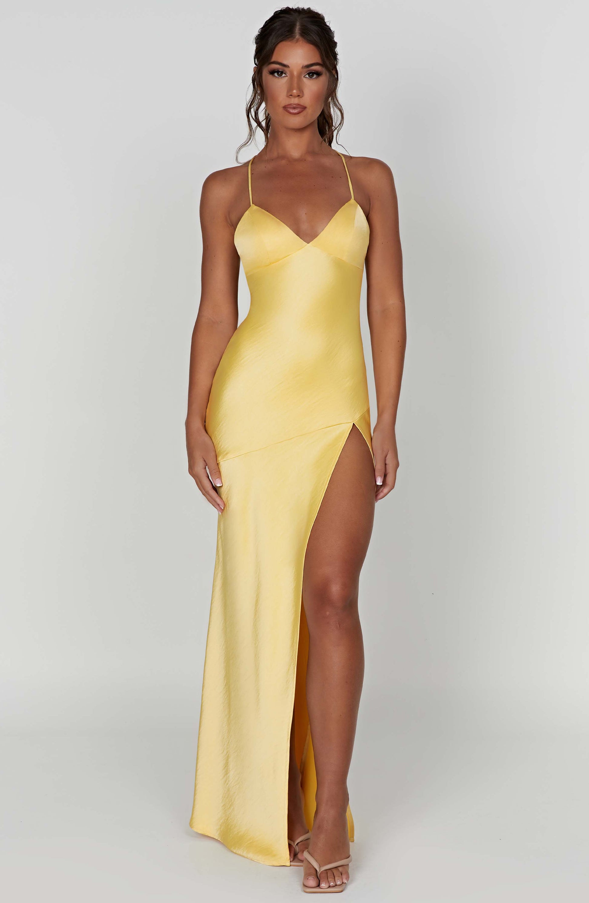 Montaracrest Adrielle Maxi Dress in vibrant lemon fabric, flowing style, lightweight material, perfect for summer occasions.
