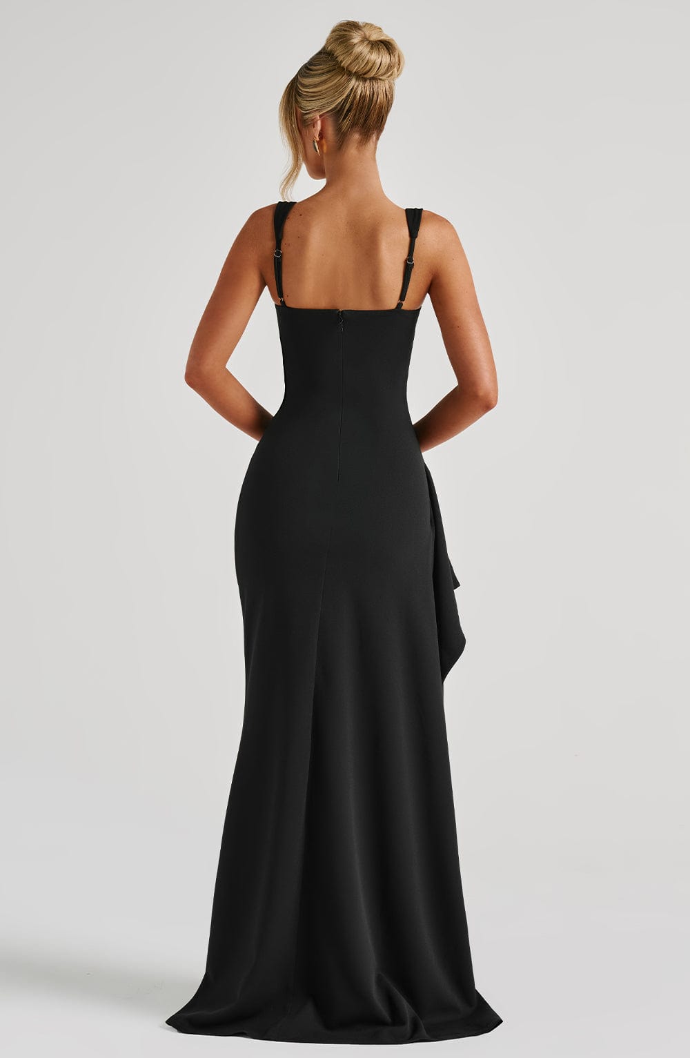 Black Iconic Maxi Dress by Montaracrest featuring a flowing silhouette and elegant design, perfect for stylish occasions.