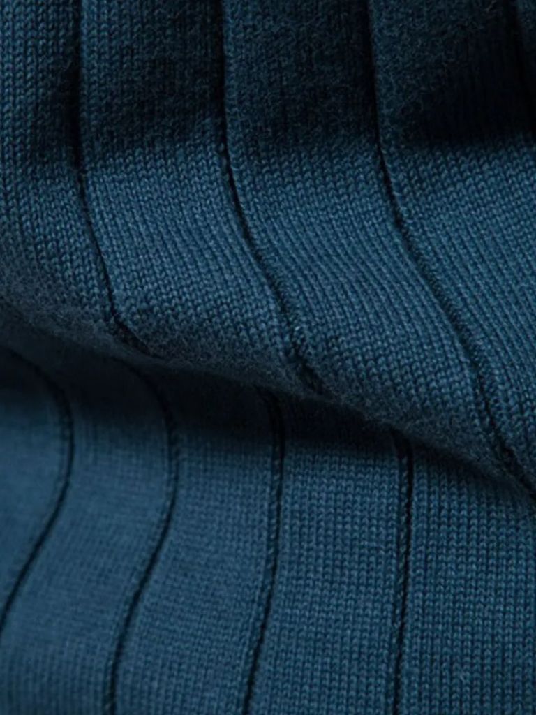 Montaracrest maglia jacquard zip-up trui in solid color, featuring a knitted design with a front zipper and subtle pattern detail.
