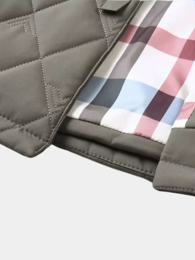 Luxury layered jacket by Montaracrest, featuring sophisticated design and cross-crown accents in a stylish, high-quality style.