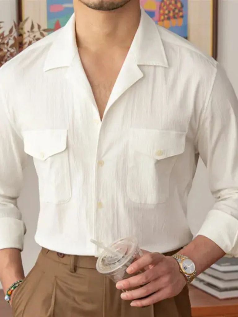 Montaracrest long-sleeve shirt with old-money style, featuring a cross crown design on light fabric.