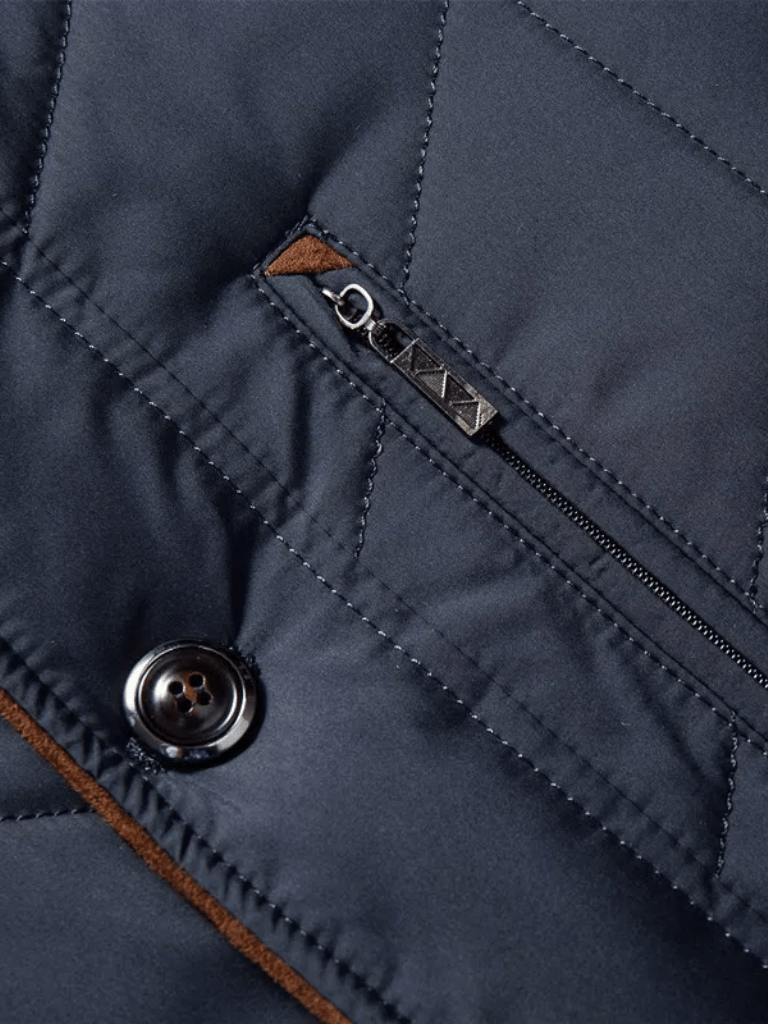 Montaracrest quilted winter jacket with cross crown design, insulated and warm for cold weather.