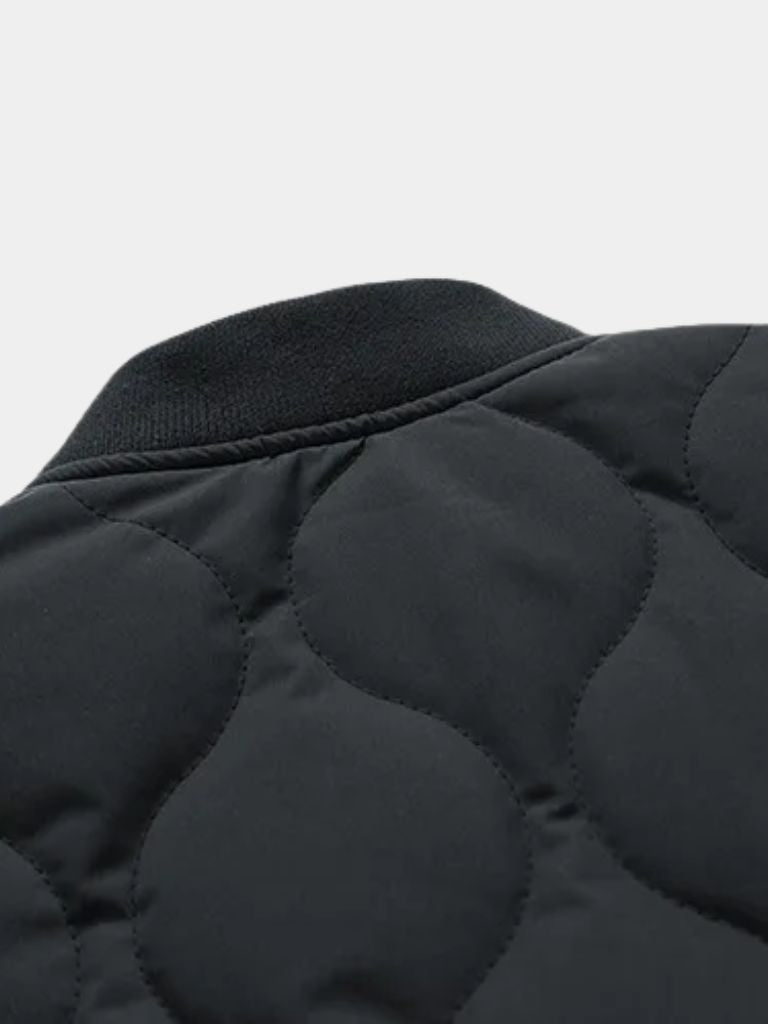 Montaracrest padded bomber jacket with Sherpa sleeves, stylish and warm, featuring a classic design and cozy fabric details.
