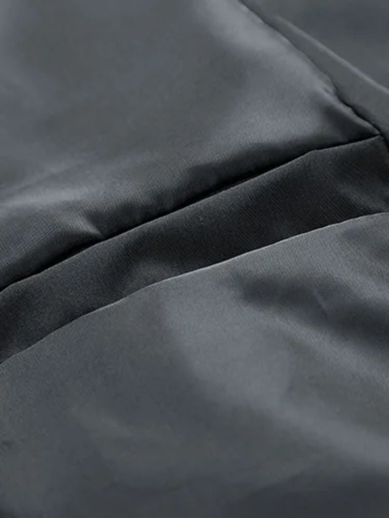 Montaracrest padded bomber jacket with Sherpa sleeves, stylish and warm outerwear for cold weather.