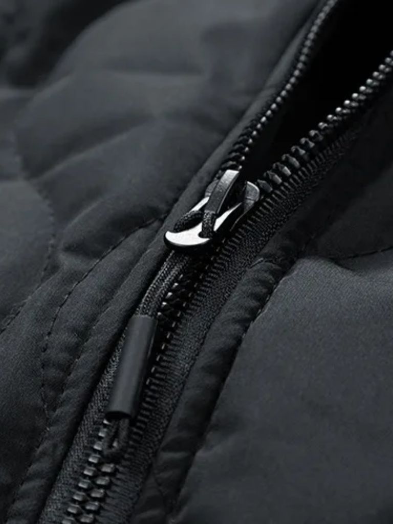 Montaracrest padded bomber jacket with Sherpa sleeves, stylish and warm for cold weather.