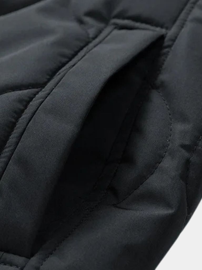 Montaracrest padded bomber jacket with cozy Sherpa sleeves, stylish and warm for cold weather.