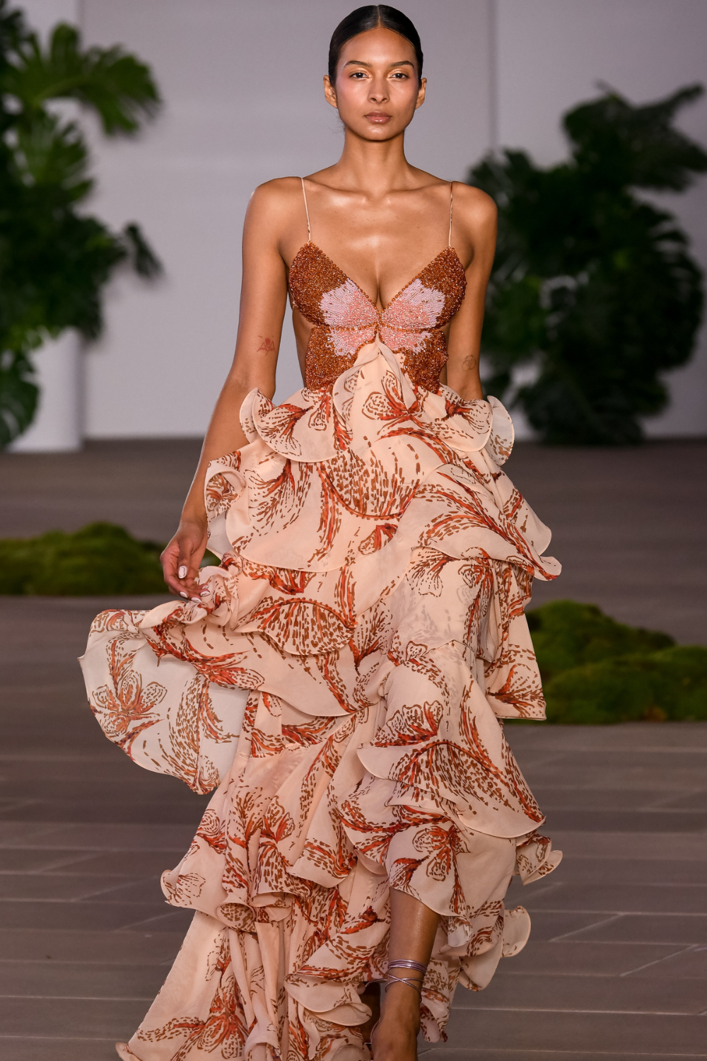 Elegant Amora Ruffle Gown by Montaracrest, flowing dress with ruffle details, perfect for spring fashion showcases.