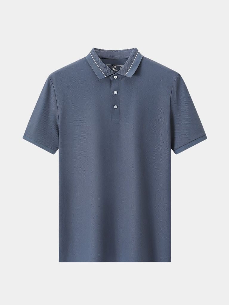 Steel grey polo shirt by Montaracrest with a subtle cross crown logo on the chest, made from comfortable fabric.
