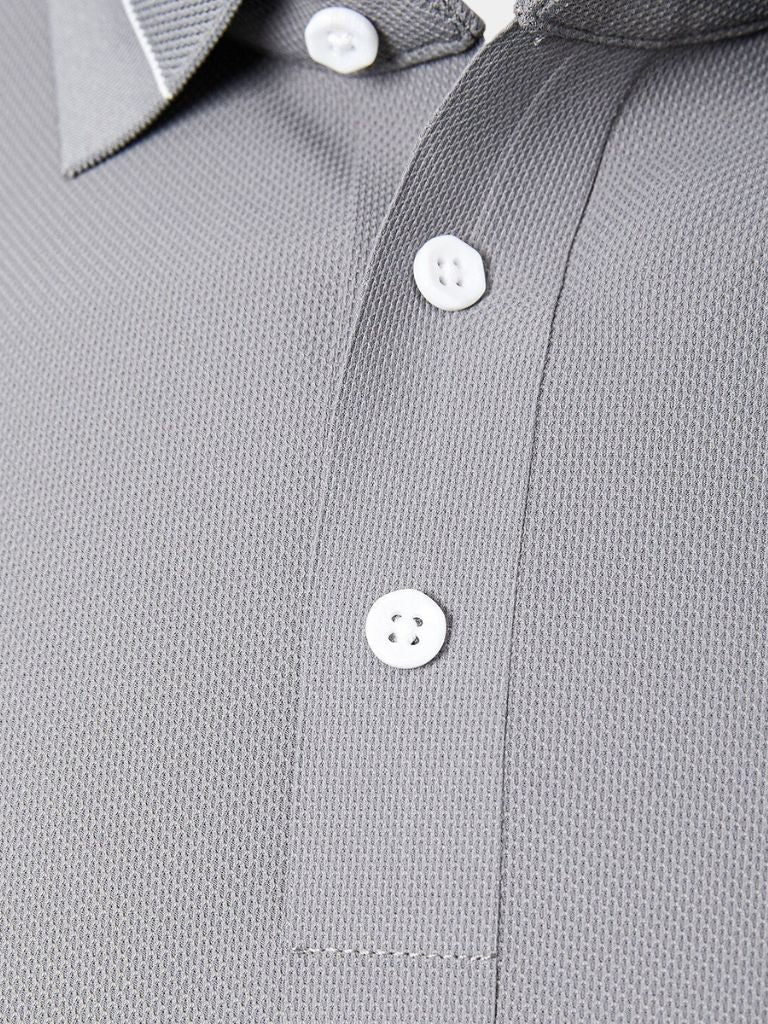 Steel grey polo shirt by Montaracrest with a cross crown logo, displayed on a hanger against a neutral background.