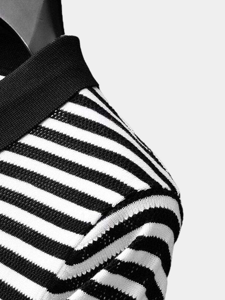 Montaracrest Polo Classica a Strisce featuring a classic striped design and a cross crown logo on a stylish polo shirt.