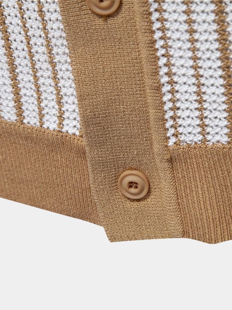 Striped-knit polo shirt by Montaracrest featuring a cross crown design, made from a textured, woven fabric.