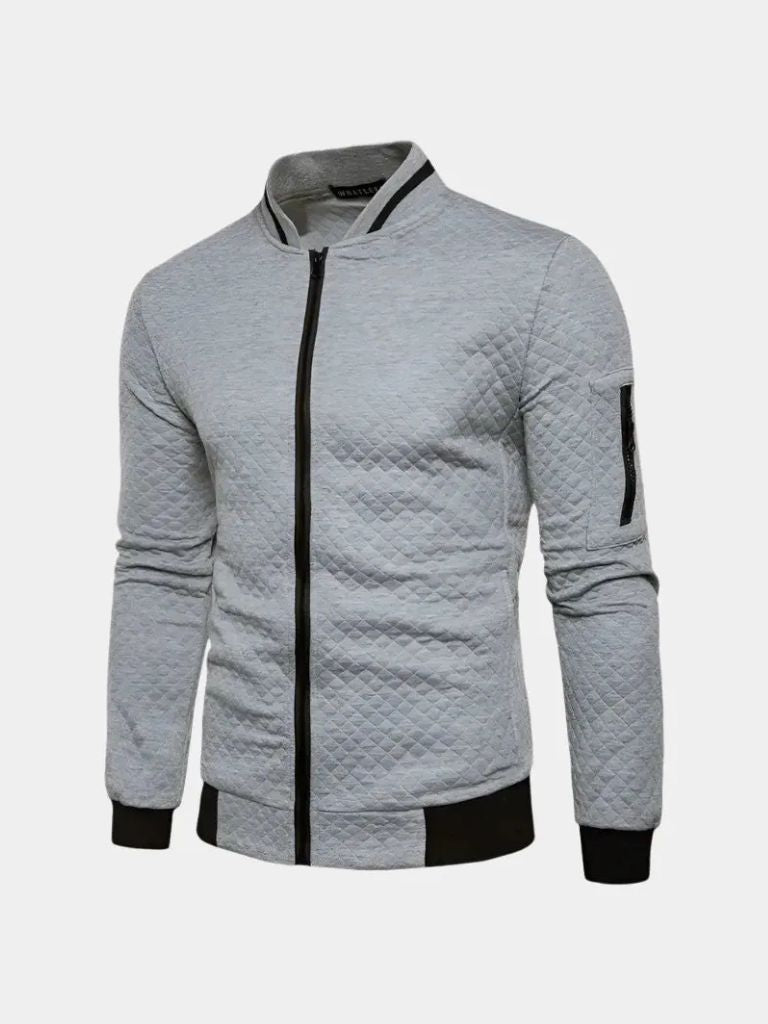 Textured casual bomber jacket by Montaracrest, structured design with a cross crown detail, ideal for a stylish everyday look.