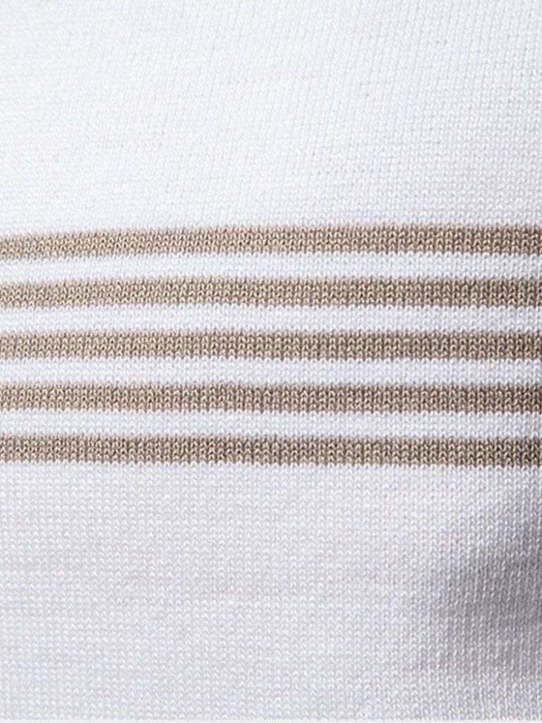 Ivory Polo shirt by Montaracrest with a cross crown logo, featuring a classic polo collar and short sleeves.