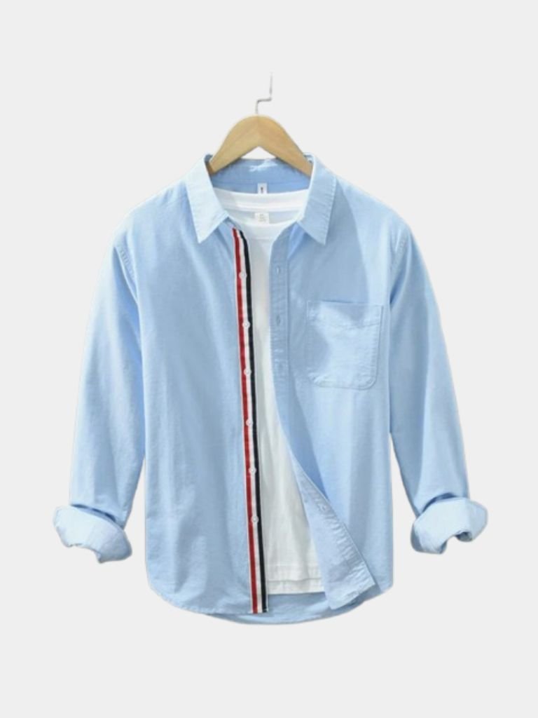 Light blue Vince linen overhemden shirt from Montaracrest with a cross crown design, displayed on a hanger.