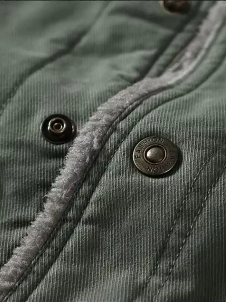 Vintage military aviator jacket by Montaracrest featuring a classic design with cross crown emblem, worn and stylish.